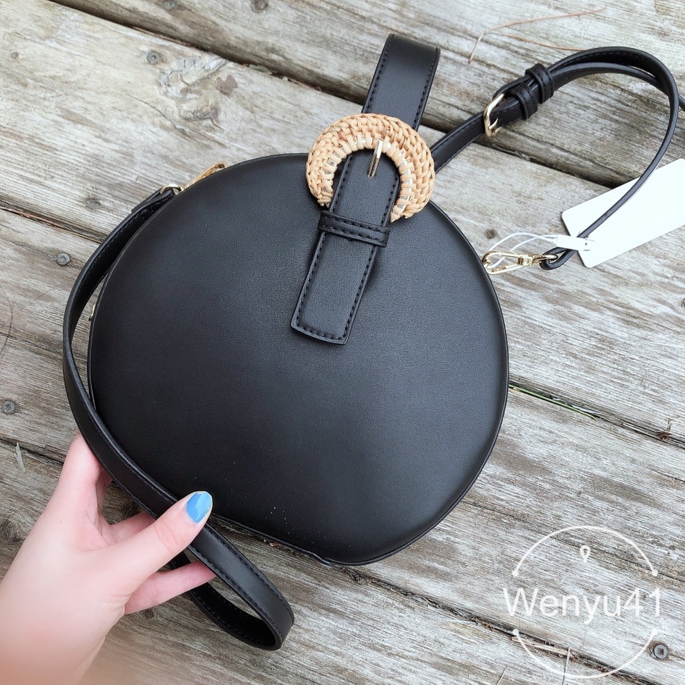 Vegan black round crossbody bag